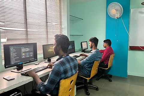 Computer lab with students at work